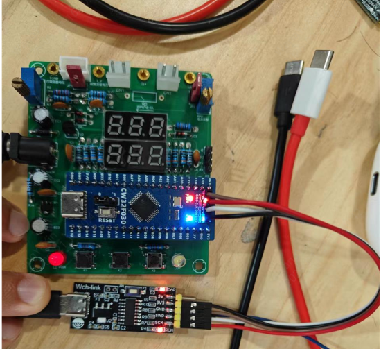 firmware flashing and debugging via a debug adapter
