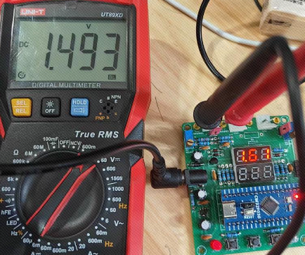 pcb prototype during verification with a multimeter