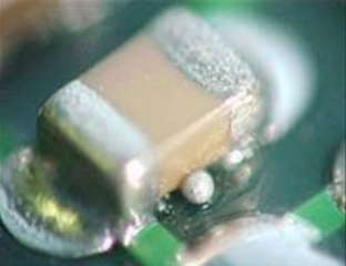 Solder beads defect around SMD Capacitor pads