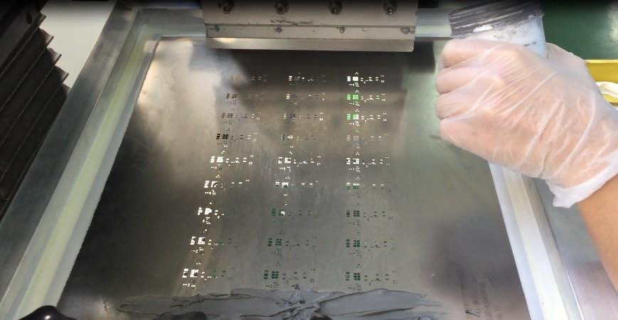 SMT solder paste screen printer squeegee in operation
